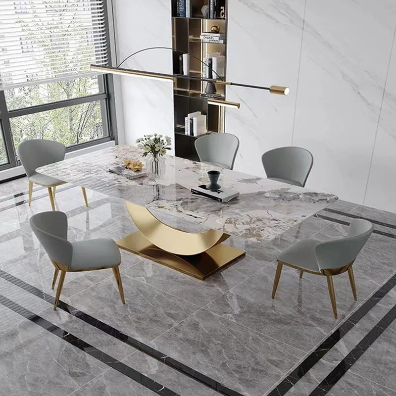 Сочетание итальянского минимализма, импортной каменной плиты, обеденного стола и обеденного стула в форме нержавеющей стали, простой современный прямоугольник Изображение 0