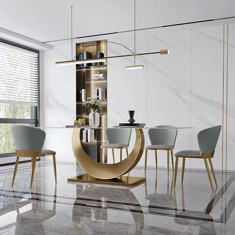 Сочетание итальянского минимализма, импортной каменной плиты, обеденного стола и обеденного стула в форме нержавеющей стали, простой современный прямоугольник Изображение 1