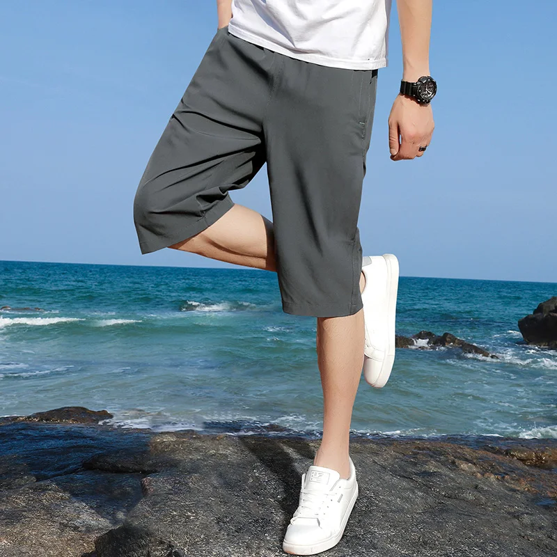 Мужские капри Летние тонкие свободного покроя повседневные спортивные брюки Мужские шорты Тренд жаркого лета Изображение 0